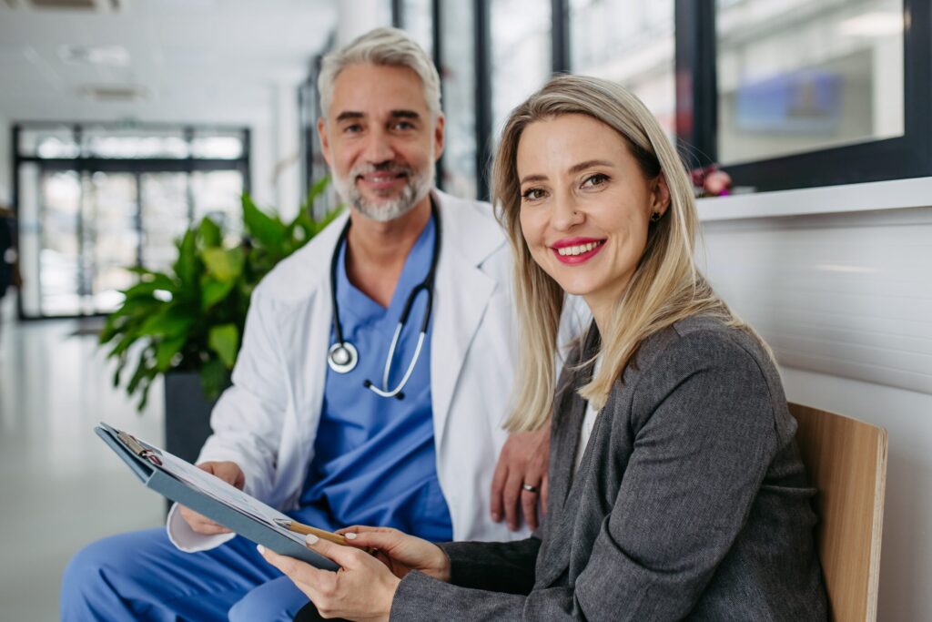 Pharmaceutical,Sales,Representative,Presenting,New,Medication,To,Doctor,In,Medical