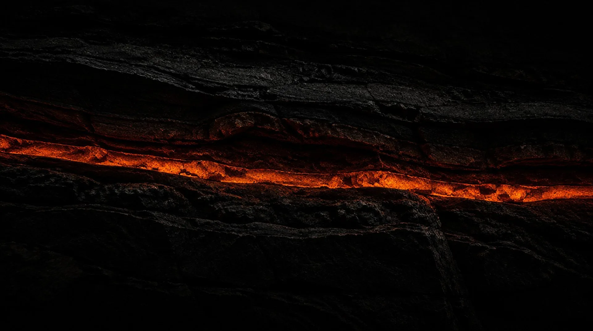 Glowing orange seam running through layers of dark rock